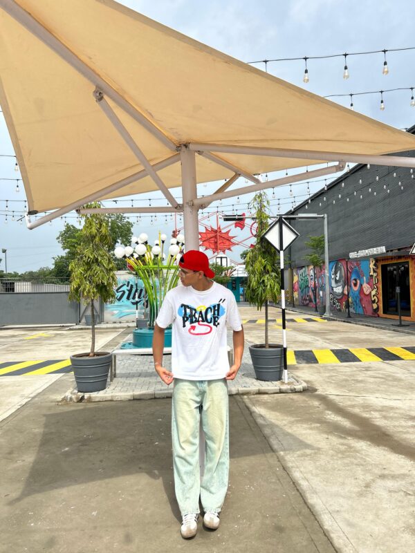 PHOTO-2025-07-24-22-01-04 12 Teach Peace Graphic Tee